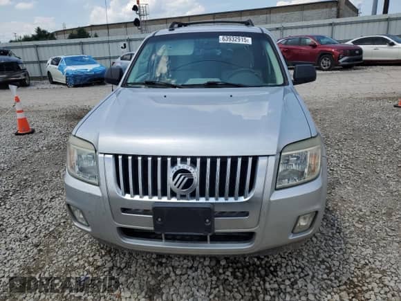 2009 Mercury Mariner с VIN 4M2CU81G69KJ03673, выставлен на аукционе Copart как лот 63932915 с пробегом 71 072 миль миль и Списание • Salvage title. История ставок и продаж доступна на DreamBid. Изображение 5.