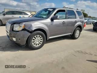 2010 Mercury Mariner Premier z VIN 4M2CN8H7XAKJ25120, wystawiony jako Copart lot #89696605 z przebiegiem 202 807 mil mil oraz Szkoda całkowita • Salvage title. Historia ofert i sprzedaży dostępna na DreamBid. Obrazek 1.