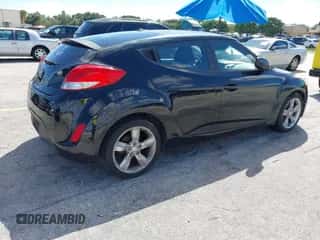 2015 Hyundai Veloster with VIN KMHTC6AD6FU229384, listed as a IAAI auction lot 43347439 with 144,004 mi miles and . Bid and sale history available at DreamBid. Image 4.