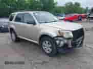 2010 Mercury Mariner z VIN 4M2CN8B73AKJ05123, wystawiony jako IAAI lot #42512923 z przebiegiem 240 736 mil mil oraz . Historia ofert i sprzedaży dostępna na DreamBid. Obrazek 1.