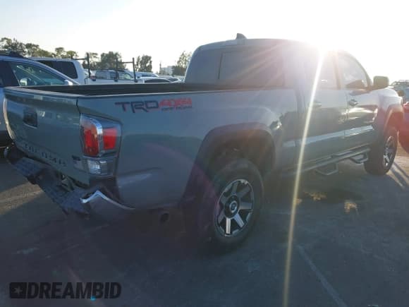 ✅ 2023 Toyota Tacoma TRD Off Road • VIN: 3TMDZ5BN2PM150289 • Lot: 43627345. Listed on IAAI with 60,603 mi. Free auction sales archive from the USA and detailed vehicle history report at DreamBid. Image 4.