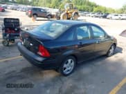 ✅ 2003 Ford Focus ZTS • VIN: 1FAFP38373W276950 • Lot: 42798021. Listed on IAAI with 120,051 mi. Free auction sales archive from the USA and detailed vehicle history report at DreamBid. Image 4.