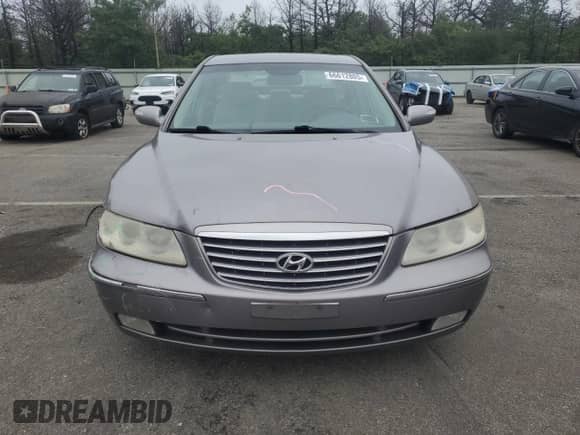 2007 Hyundai Azera SE с VIN KMHFC46F97A188781, выставлен на аукционе Copart как лот 66612805 с пробегом 144 099 миль миль и Списание • Salvage title. История ставок и продаж доступна на DreamBid. Изображение 5.