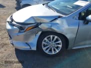 ✅ 2023 Toyota Corolla Hybrid LE • VIN: JTDBCMFE7P3026002 • Лот: 43389358. Опубликован ранее на IAAI с пробегом 23 628 миль. Бесплатный доступ к архиву аукционных продаж из США и подробный отчёт об истории автомобиля на DreamBid. Изображение 6.