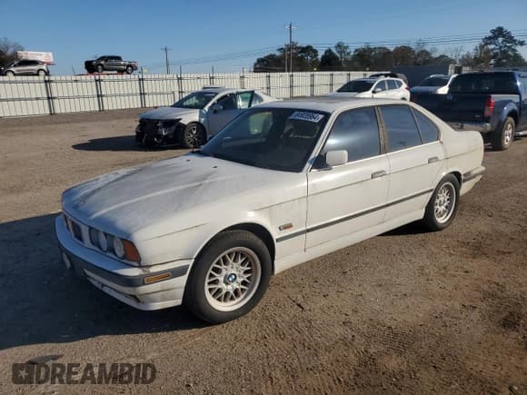 ✅ 1995 BMW 5 Series 525i • VIN: WBAHD5329SGB39457 • Lot: 84928964. Listed on Copart with 136,095 mi. Free auction sales archive from the USA and detailed vehicle history report at DreamBid. Image 1.