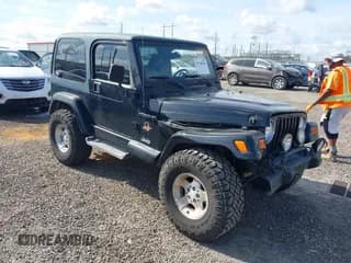 ✅ 2002 Jeep Wrangler Sahara • VIN: 1J4FA59S62P756767 • Лот: 43730556. Опубликован ранее на IAAI с пробегом 145 681 миль. Бесплатный доступ к архиву аукционных продаж из США и подробный отчёт об истории автомобиля на DreamBid. Изображение 1.