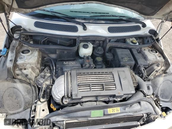 ✅ 2004 MINI Hardtop S • VIN: WMWRE33434TD81033 • Lot: 63759035. Listed on Copart with 319,648 mi. Free auction sales archive from the USA and detailed vehicle history report at DreamBid. Image 11.