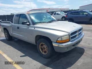 1999 Dodge Dakota SLT with VIN 1B7GL22X9XS258964, listed as a IAAI auction lot 42309862 with 177,561 mi miles and . Bid and sale history available at DreamBid. Image 1.