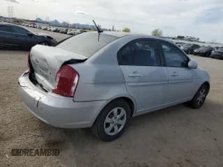 ✅ 2009 Hyundai Accent Auto GLS • VIN: KMHCN46C09U310271 • Лот: 51095345. Опубликован ранее на Copart с пробегом 135 800 миль. Бесплатный доступ к архиву аукционных продаж из США и подробный отчёт об истории автомобиля на DreamBid. Изображение 3.