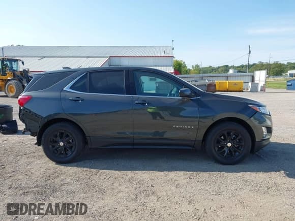 ✅ 2020 Chevrolet Equinox LT • VIN: 2GNAXKEV0L6136311 • Lot: 43165438. Listed on IAAI with 97,615 mi. Free auction sales archive from the USA and detailed vehicle history report at DreamBid. Image 14.