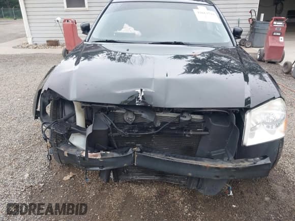 ✅ 2005 Dodge Magnum RT • VIN: 2D8GV58275H670202 • Lot: 42663710. Listed on IAAI with 94,986 mi. Free auction sales archive from the USA and detailed vehicle history report at DreamBid. Image 6.