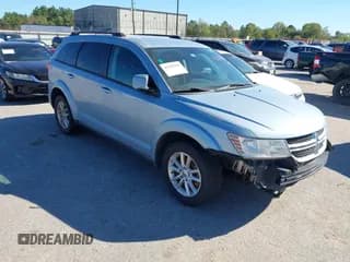 ✅ 2013 Dodge Journey SXT • VIN: 3C4PDCBG4DT705410 • Lot: 43658385. Listed on IAAI with 239,350 mi. Free auction sales archive from the USA and detailed vehicle history report at DreamBid. Image 1.
