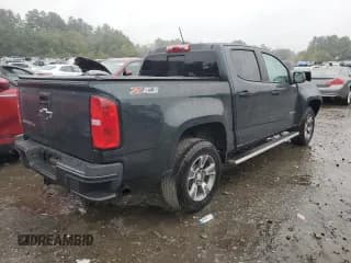 ✅ 2018 Chevrolet Colorado 4WD Z71 • VIN: 1GCGTDEN3J1207723 • Лот: 69372683. Опубликован ранее на Copart с пробегом 74 673 миль. Бесплатный доступ к архиву аукционных продаж из США и подробный отчёт об истории автомобиля на DreamBid. Изображение 3.