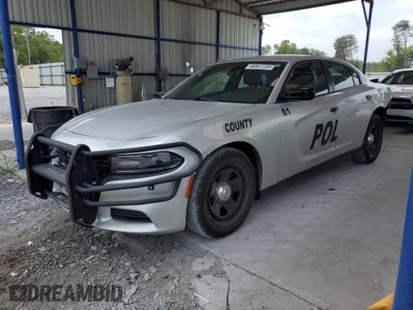 2019 Dodge Charger Police с VIN 2C3CDXAT0KH558470, выставлен на аукционе Copart как лот 66067235 с пробегом 98 349 миль миль и Списание • Salvage title. История ставок и продаж доступна на DreamBid. Изображение 1.