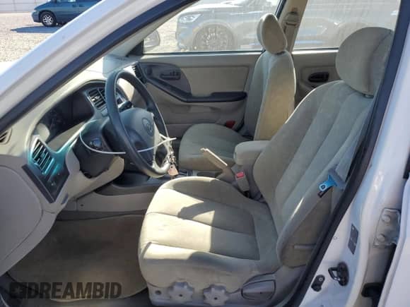 2003 Hyundai Elantra GLS z VIN KMHDN45D13U521386, wystawiony jako Copart lot #75726144 z przebiegiem 169 663 mil mil oraz Szkoda całkowita • Salvage title. Historia ofert i sprzedaży dostępna na DreamBid. Obrazek 7.