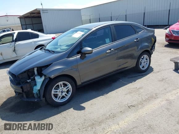 ✅ 2017 Ford Fiesta SE • VIN: 3FADP4BJ9HM125975 • Lot: 42174562. Listed on IAAI with 55,661 mi. Free auction sales archive from the USA and detailed vehicle history report at DreamBid. Image 18.