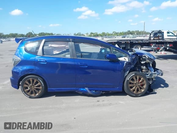 ✅ 2013 Honda Fit Sport • VIN: JHMGE8H52DC021210 • Лот: 43487361. Опубликован ранее на IAAI с пробегом 215 312 миль. Бесплатный доступ к архиву аукционных продаж из США и подробный отчёт об истории автомобиля на DreamBid. Изображение 13.