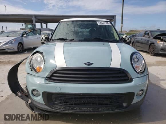 2012 MINI Hardtop with VIN WMWSU3C52CT367682, listed as a Copart auction lot 63045965 with 124,683 mi miles and Salvage title. Bid and sale history available at DreamBid. Image 5.