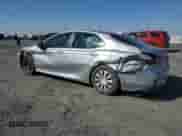 2021 Toyota Camry Hybrid LE with VIN 4T1C31AK1MU021816, listed as a Copart auction lot 82125225 with 69,205 mi miles and Salvage title. Bid and sale history available at DreamBid. Image 2.