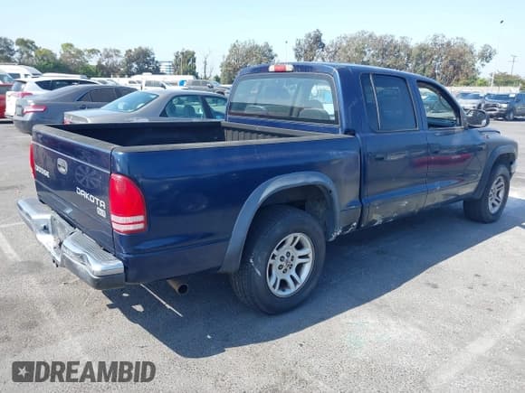 ✅ 2003 Dodge Dakota SLT • VIN: 1D7HL48X23S367452 • Lot: 42959947. Wystawiony na IAAI z przebiegiem 198 631 mil. Bezpłatny archiwum sprzedaży aukcyjnych z USA i szczegółowy raport historii pojazdu na DreamBid. Zdjęcie 4.