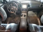 ✅ 2014 Jeep Grand Cherokee • VIN: 1C4RJEJM8EC424373 • Lot: 72256674. Listed on Copart with 128,998 mi. Free auction sales archive from the USA and detailed vehicle history report at DreamBid. Image 8.