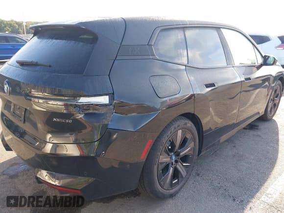 ✅ 2025 BMW iX xDrive50 • VIN: WB523CF07SCU29481 • Lot: 43130339. Listed on IAAI with 6,892 mi. Free auction sales archive from the USA and detailed vehicle history report at DreamBid. Image 6.