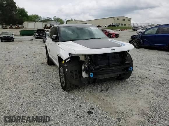 2022 Jeep Grand Cherokee Trailhawk with VIN 1C4RJYC65N8720955, listed as a Copart auction lot 51505265 with 27,618 mi miles and Salvage title. Bid and sale history available at DreamBid. Image 12.