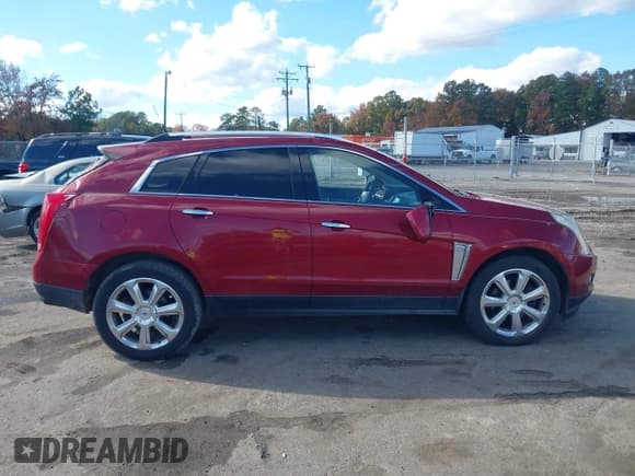 ✅ 2013 Cadillac SRX Performance Collection • VIN: 3GYFNDE36DS543481 • Лот: 43571699. Опубликован ранее на IAAI с пробегом 113 401 миль. Бесплатный доступ к архиву аукционных продаж из США и подробный отчёт об истории автомобиля на DreamBid. Изображение 13.