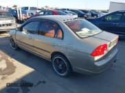 ✅ 2002 Honda Civic LX • VIN: 1HGES16502L020695 • Lot: 43629504. Listed on IAAI with 191,312 mi. Free auction sales archive from the USA and detailed vehicle history report at DreamBid. Image 3.