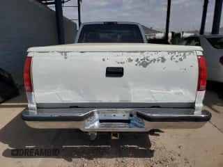 1996 Chevrolet Silverado 2500 с VIN 1GCGC29J7TE263932, выставлен на аукционе Copart как лот 51643115 с пробегом 105 102 миль миль и Списание • Salvage title. История ставок и продаж доступна на DreamBid. Изображение 6.