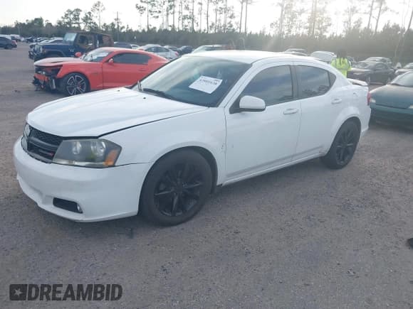 ✅ 2013 Dodge Avenger SXT • VIN: 1C3CDZCG3DN702969 • Lot: 43801638. Listed on IAAI with 198,998 mi. Free auction sales archive from the USA and detailed vehicle history report at DreamBid. Image 2.