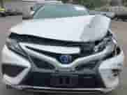 2021 Toyota Camry Hybrid XSE with VIN 4T1K31AK6MU020821, listed as a IAAI auction lot 42283548 with 61,171 mi miles and . Bid and sale history available at DreamBid. Image 18.