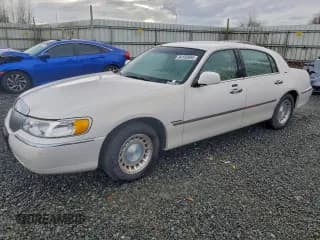 ✅ 2000 Lincoln Town Car Executive • VIN: 1LNHM81W5YY765769 • Lot: 94150685. Listed on Copart with 118,699 mi. Free auction sales archive from the USA and detailed vehicle history report at DreamBid. Image 1.
