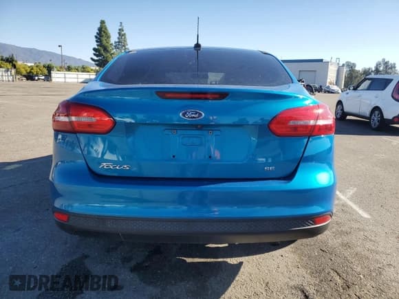 ✅ 2015 Ford Focus SE • VIN: 1FADP3F28FL336306 • Lot: 82486065. Listed on Copart with 74,978 mi. Free auction sales archive from the USA and detailed vehicle history report at DreamBid. Image 6.