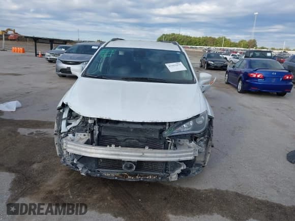 ✅ 2017 Chrysler Pacifica Touring L Plus • VIN: 2C4RC1EG4HR634083 • Лот: 43393475. Опубликован ранее на IAAI с пробегом 106 155 миль. Бесплатный доступ к архиву аукционных продаж из США и подробный отчёт об истории автомобиля на DreamBid. Изображение 13.