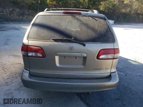 ✅ 2001 Toyota Sienna LE • VIN: 4T3ZF13C11U390198 • Lot: 76785094. Listed on Copart with 200,803 mi. Free auction sales archive from the USA and detailed vehicle history report at DreamBid. Image 6.