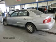 ✅ 2003 Kia Optima LX • VIN: KNAGD126335211255 • Лот: 60637665. Опубликован ранее на Copart с пробегом Не указан. Бесплатный доступ к архиву аукционных продаж из США и подробный отчёт об истории автомобиля на DreamBid. Изображение 2.
