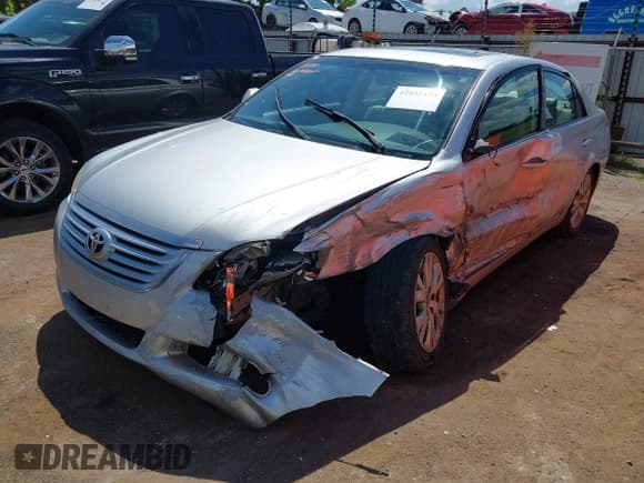 ✅ 2009 Toyota Avalon XL • VIN: 4T1BK36B39U326549 • Лот: 42895179. Опубликован ранее на IAAI с пробегом 169 033 миль. Бесплатный доступ к архиву аукционных продаж из США и подробный отчёт об истории автомобиля на DreamBid. Изображение 2.