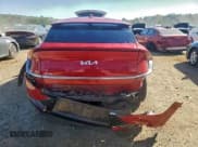 ✅ 2024 Kia EV6 Wind • VIN: KNDC34LA6R5614289 • Lot: 94752815. Wystawiony na Copart z przebiegiem 44 541 mil. Bezpłatny archiwum sprzedaży aukcyjnych z USA i szczegółowy raport historii pojazdu na DreamBid. Zdjęcie 6.