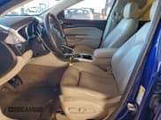 ✅ 2012 Cadillac SRX Luxury Collection • VIN: 3GYFNAE39CS571885 • Lot: 95023075. Wystawiony na Copart z przebiegiem 20 760 mil. Bezpłatny archiwum sprzedaży aukcyjnych z USA i szczegółowy raport historii pojazdu na DreamBid. Zdjęcie 7.