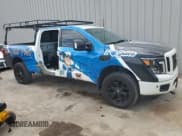 ✅ 2018 Nissan Titan Platinum Reserve • VIN: 1N6BA1F40JN516592 • Lot: 61404715. Listed on Copart with 88,412 mi. Free auction sales archive from the USA and detailed vehicle history report at DreamBid. Image 4.