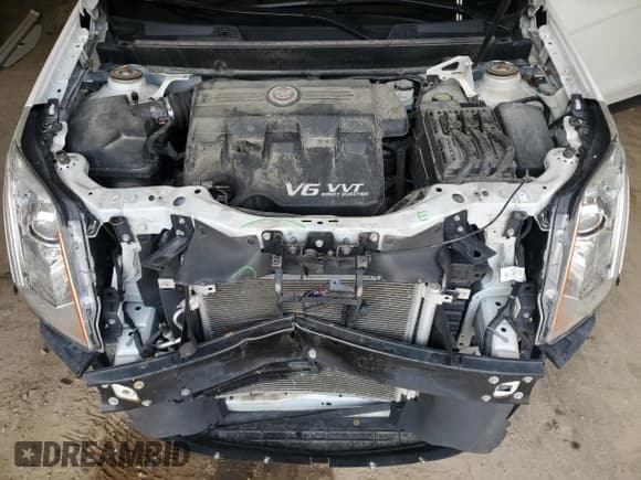 ✅ 2016 Cadillac SRX Premium Collection • VIN: 3GYFNDE34GS552894 • Lot: 64945985. Listed on Copart with 105,751 mi. Free auction sales archive from the USA and detailed vehicle history report at DreamBid. Image 11.