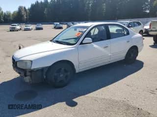 2002 Hyundai Elantra GLS z VIN KMHDN45D92U366892, wystawiony jako Copart lot #69294605 z przebiegiem 318 991 mil mil oraz Szkoda całkowita • Salvage title. Historia ofert i sprzedaży dostępna na DreamBid. Obrazek 1.