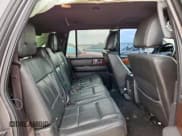 ✅ 2013 Lincoln Navigator • VIN: 5LMJJ3H51DEL08198 • Lot: 63591615. Wystawiony na Copart z przebiegiem 191 836 mil. Bezpłatny archiwum sprzedaży aukcyjnych z USA i szczegółowy raport historii pojazdu na DreamBid. Zdjęcie 11.