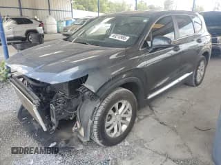 ✅ 2020 Hyundai Santa Fe SE • VIN: 5NMS23AD9LH229772 • Lot: 69210985. Wystawiony na Copart z przebiegiem 63 561 mil. Bezpłatny archiwum sprzedaży aukcyjnych z USA i szczegółowy raport historii pojazdu na DreamBid. Zdjęcie 1.