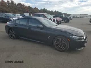 ✅ 2022 BMW 8 Series 840i • VIN: WBAGV4C09NCJ34091 • Lot: 74866423. Listed on Copart with 36,632 mi. Free auction sales archive from the USA and detailed vehicle history report at DreamBid. Image 4.