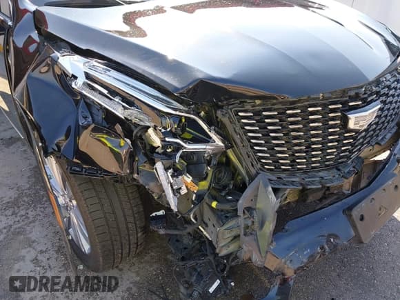 ✅ 2023 Cadillac XT5 AWD Premium Luxury • VIN: 1GYKNDRS0PZ227985 • Lot: 43214039. Listed on IAAI with 40,620 mi. Free auction sales archive from the USA and detailed vehicle history report at DreamBid. Image 6.