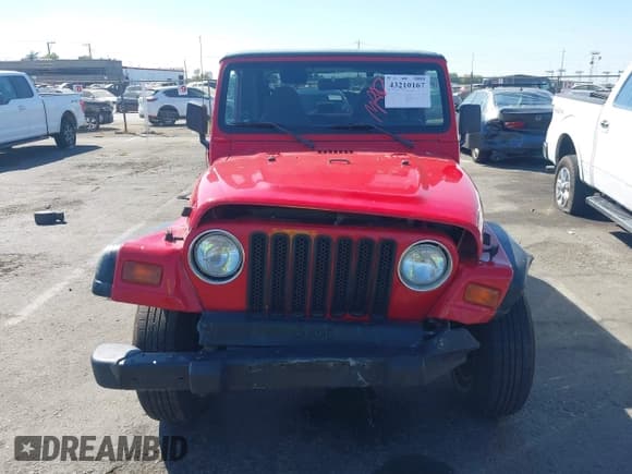 ✅ 1999 Jeep Wrangler Sport • VIN: 1J4FY19S2XP489428 • Лот: 43210167. Опубликован ранее на IAAI с пробегом 185 950 миль. Бесплатный доступ к архиву аукционных продаж из США и подробный отчёт об истории автомобиля на DreamBid. Изображение 6.
