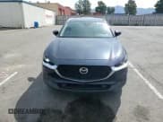 ✅ 2022 Mazda CX-30 2.5 Turbo • VIN: 3MVDMBAY6NM434688 • Lot: 71542145. Listed on Copart with 36,009 mi. Free auction sales archive from the USA and detailed vehicle history report at DreamBid. Image 14.