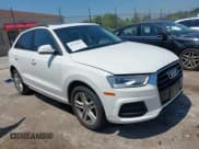 ✅ 2017 Audi Q3 Premium • VIN: WA1BCCFS7HR009192 • Lot: 42734919. Listed on IAAI with 100,100 mi. Free auction sales archive from the USA and detailed vehicle history report at DreamBid. Image 1.